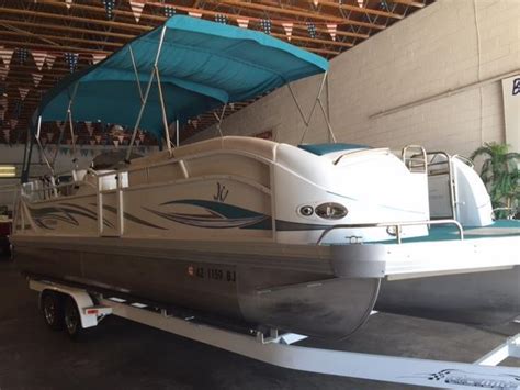 2014 JC Tritoon powered by an Evinrude E-Tec 250HO 2 stroke outboard with 115 hours. . 2005 jc tritoon for sale